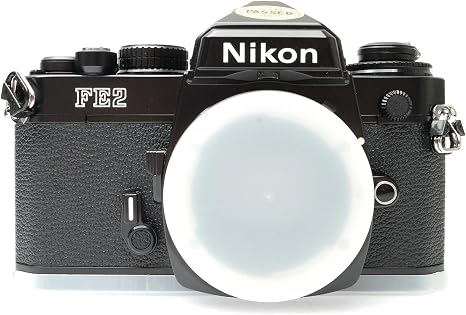 Nikon FE2 film SLR camera with black body; no lens