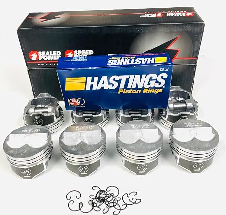 .275" Dome coated Pistons Set of (8) and Matching moly rings compatible with 350 Chevy 11.9:1. Click size needed before adding to Cart! (STD 4.000" Bore diameter)